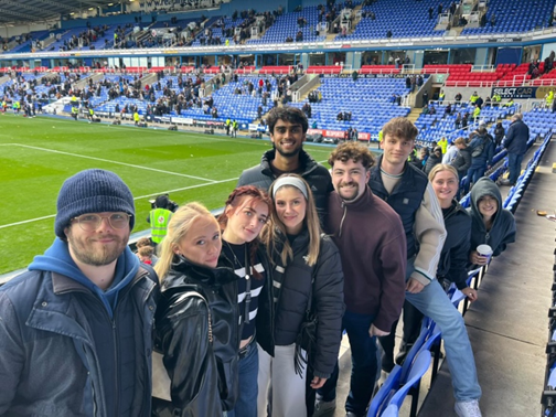 Lily and her flatmates at the Select Car Leasing Stadium, home of Reading FC.